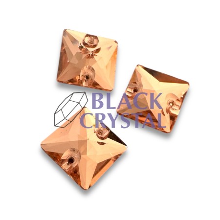 Złote kryształki ozdobne o eleganckim połysku, idealne do strojów tanecznych i scenicznych.