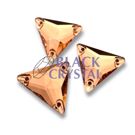 Złote kryształki ozdobne o eleganckim połysku, idealne do strojów tanecznych i scenicznych.