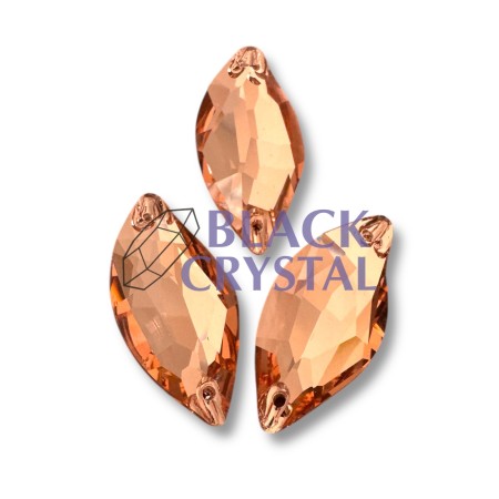 Złote kryształki ozdobne o eleganckim połysku, idealne do strojów tanecznych i scenicznych.