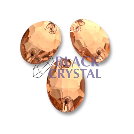 Złote kryształki ozdobne o eleganckim połysku, idealne do strojów tanecznych i scenicznych.