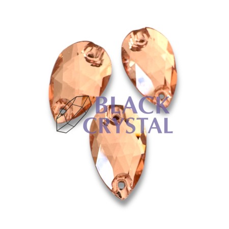 Złote kryształki ozdobne o eleganckim połysku, idealne do strojów tanecznych i scenicznych.